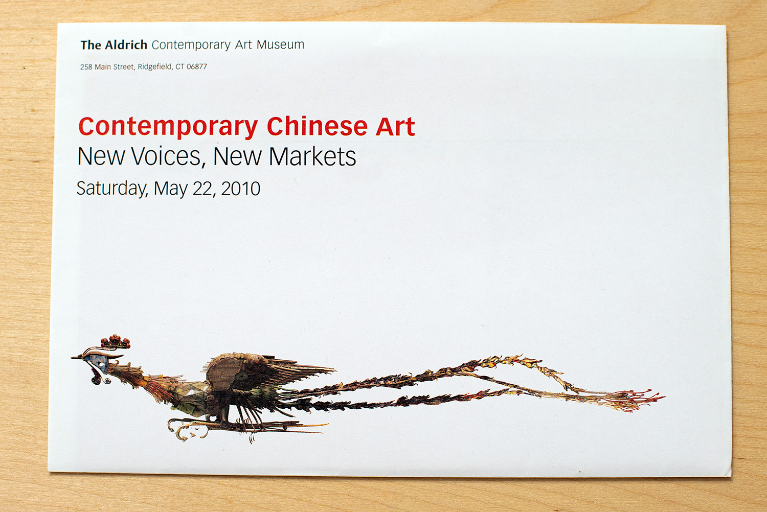 photo of envelope featuring Xu Bing's Phoenix