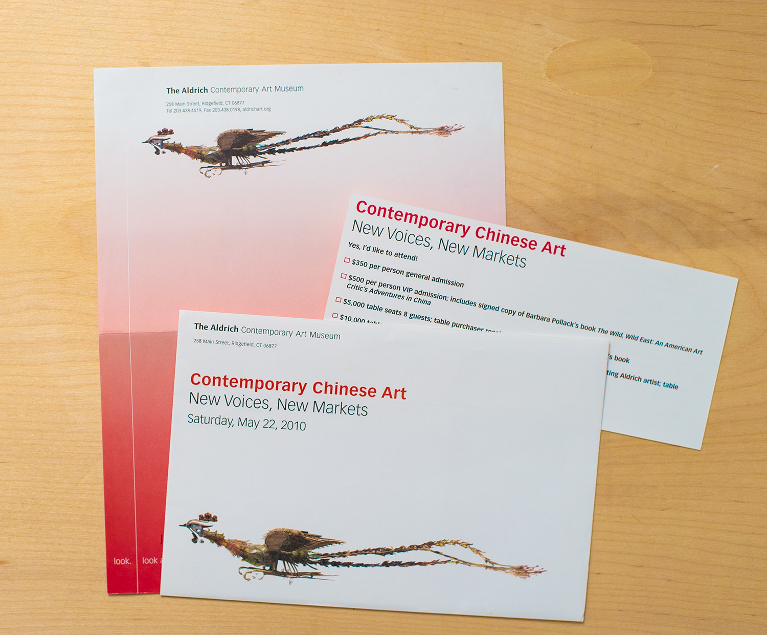 photo of letterhead, envelope and reply card featuring Xu Bing's Phoenix