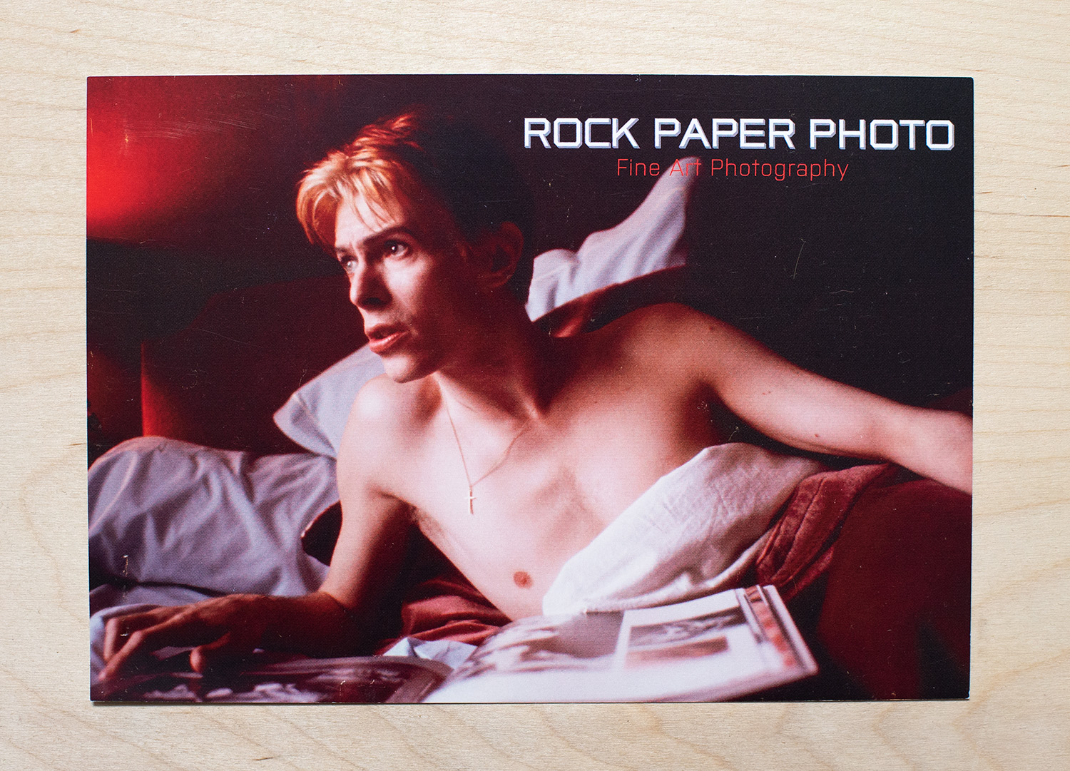 Postcard featuring a photo of David Bowie by photographer Andrew Kent